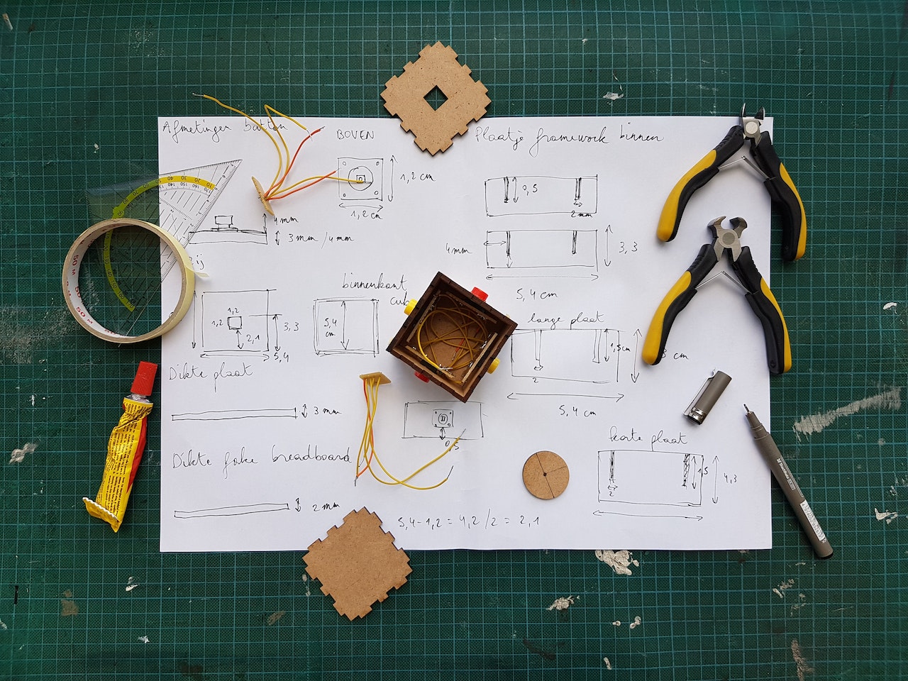 White Diagram Paper Under Pliers